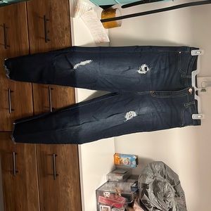 Dark jeans with rips